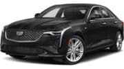 Sleek black luxury sedan with modern grille design, stylish wheels, and aerodynamic profile.