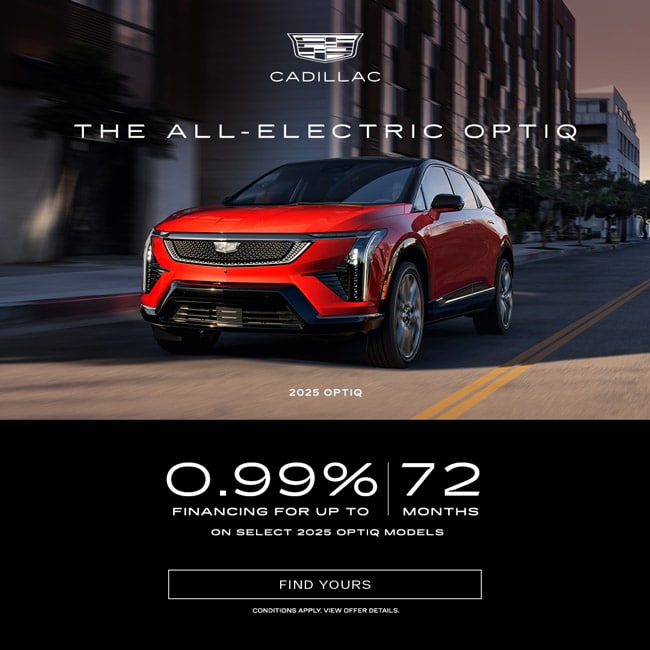 Red 2025 Cadillac Optiq driving in city with 0.99% financing offer for up to 72 months highlighted.