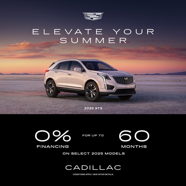 Cadillac ad featuring 2025 XT5 SUV with 0% financing for up to 60 months offer. Scenic sunset background.